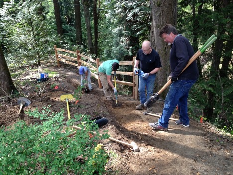 Partnering with Forest Park Conservancy to widen the trail and build split-rail fencing, photo courtesy of WEHOA